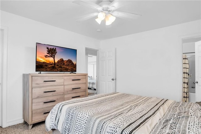 bedroom with ceiling fan and light colored carpet