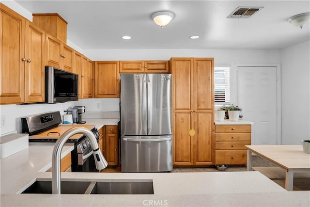 kitchen with sink and stainless steel appliances