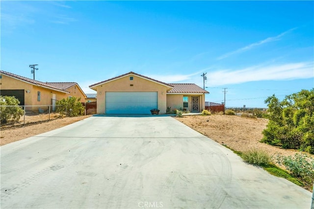 single story home with a garage