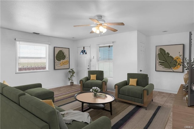 living room with ceiling fan