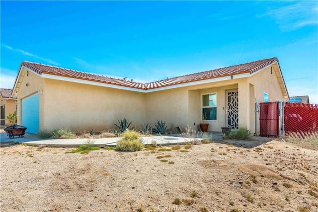 view of front of home with a garage