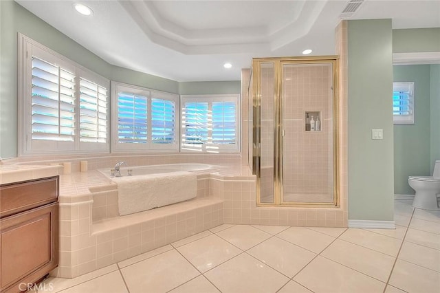 full bathroom featuring vanity, independent shower and bath, and tile patterned flooring