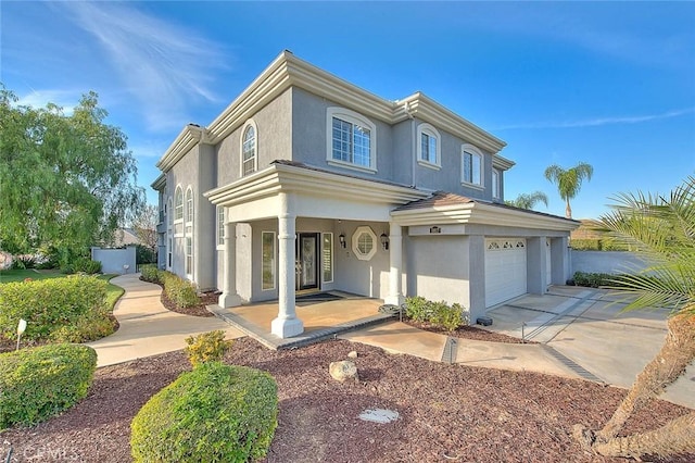 view of front of property with a garage