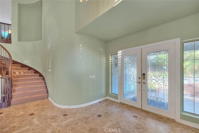 entryway featuring french doors