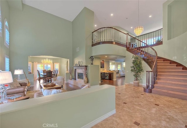 interior space featuring an inviting chandelier and a fireplace