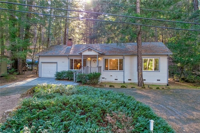 single story home featuring a garage