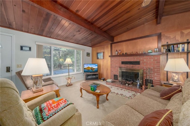 living room with wood ceiling, a fireplace, and lofted ceiling with beams