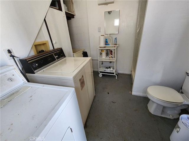 laundry area featuring washing machine and dryer