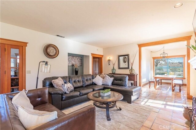 living room with light tile patterned floors