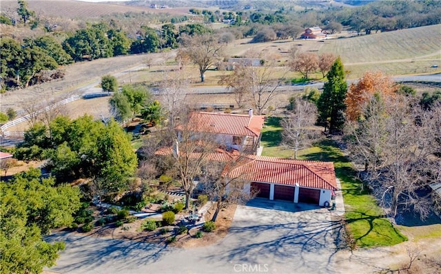 birds eye view of property featuring a rural view