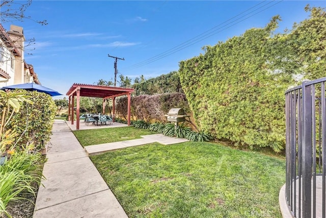 view of yard featuring a patio and a pergola