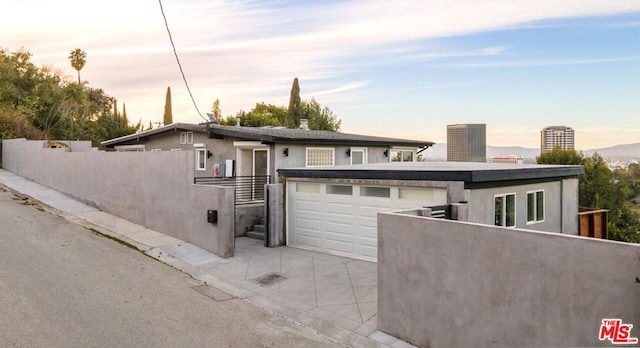 view of front of home featuring a garage