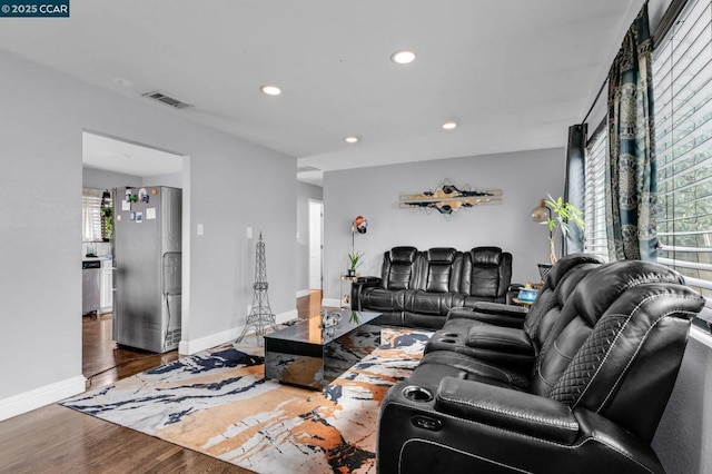 living room featuring dark hardwood / wood-style flooring