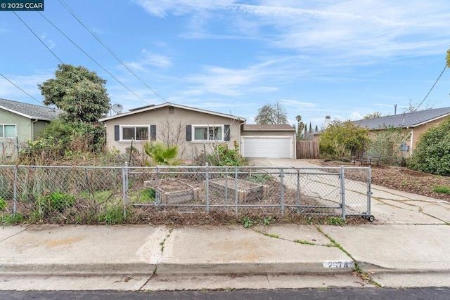 ranch-style house featuring a garage