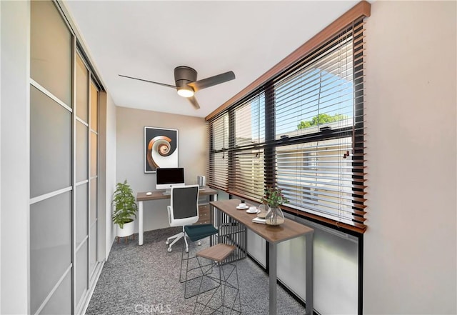 home office with carpet and ceiling fan