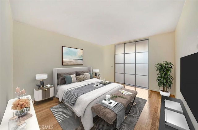 bedroom featuring light wood-type flooring