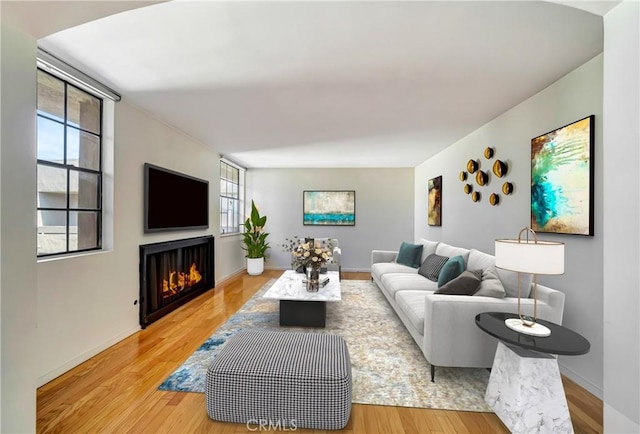 living room with light hardwood / wood-style floors