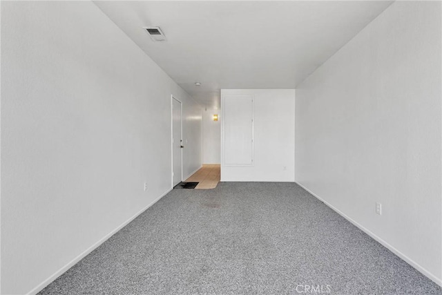 spare room with carpet floors