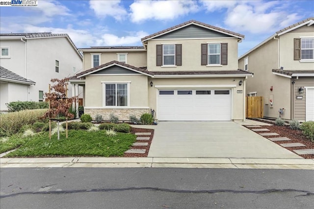 front of property with a garage