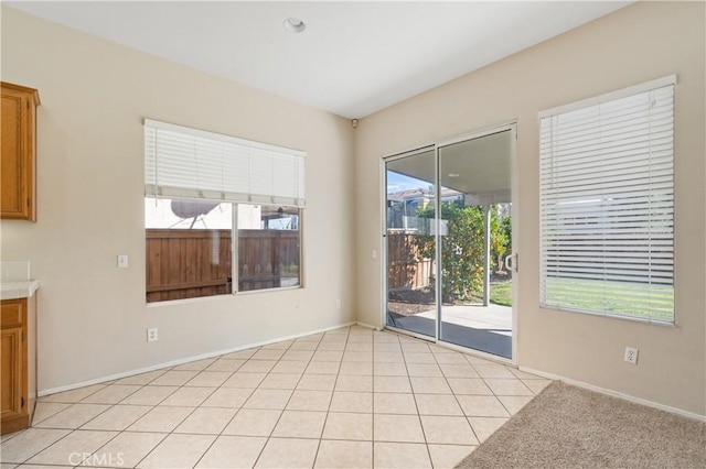 empty room with light tile patterned flooring