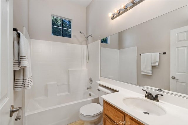 full bathroom featuring shower / bath combination, vanity, and toilet