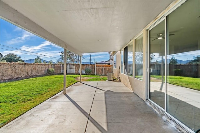 view of patio / terrace featuring ceiling fan