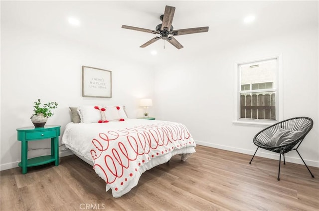 bedroom with wood-type flooring