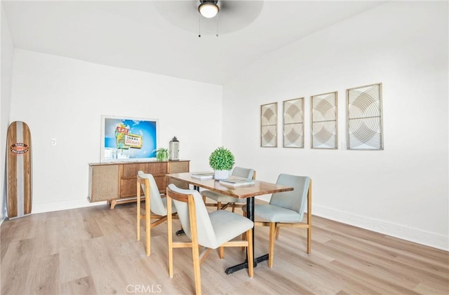 dining room featuring ceiling fan and light hardwood / wood-style floors