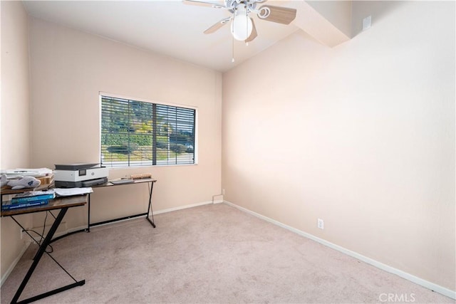 home office featuring light colored carpet and ceiling fan