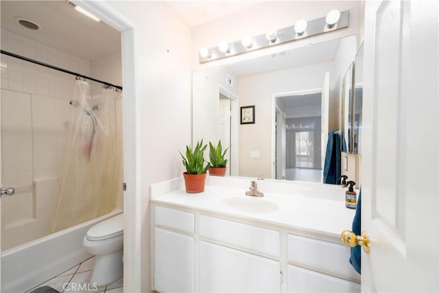 full bathroom featuring shower / tub combo with curtain, vanity, tile patterned floors, and toilet