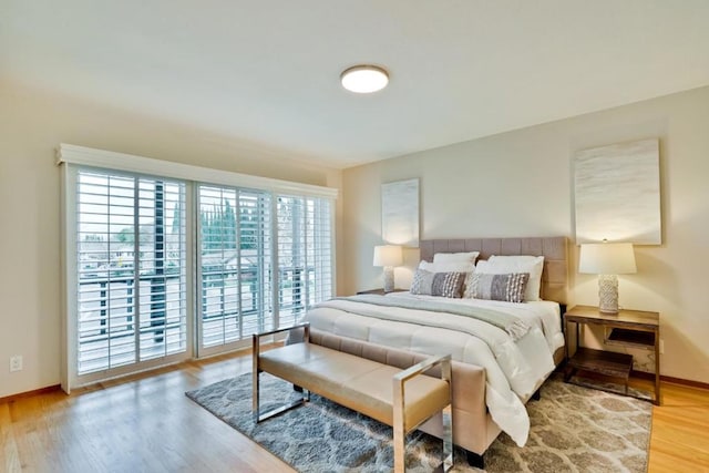 bedroom with wood-type flooring