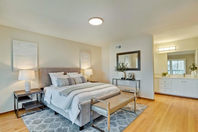 bedroom with light hardwood / wood-style flooring