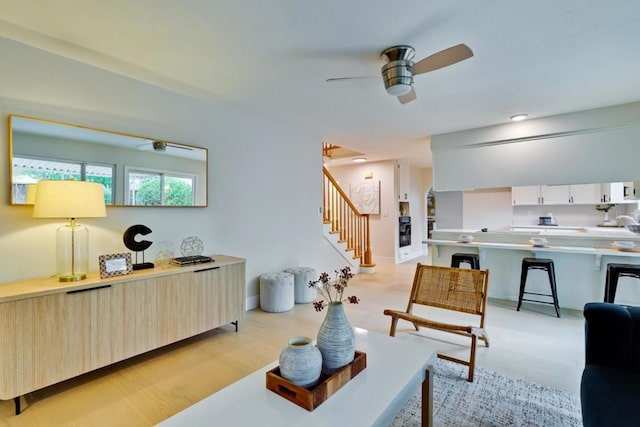 living room featuring ceiling fan