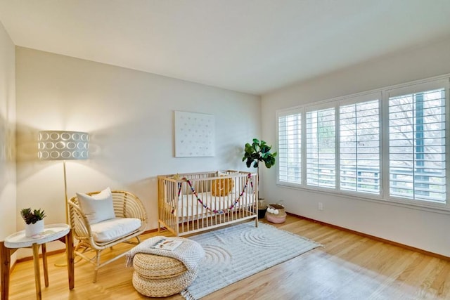 bedroom with wood-type flooring