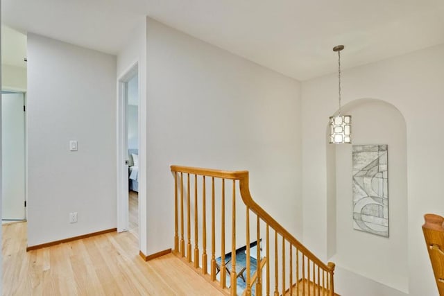 stairway featuring hardwood / wood-style flooring