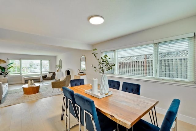 dining space featuring light hardwood / wood-style flooring