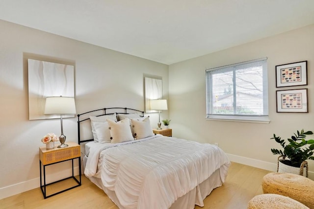 bedroom featuring light wood-type flooring