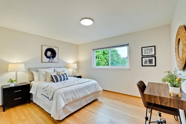 bedroom with light hardwood / wood-style flooring