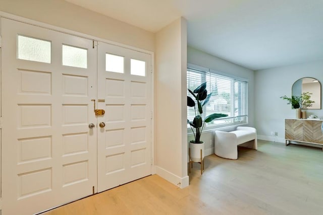 entryway with light wood-type flooring