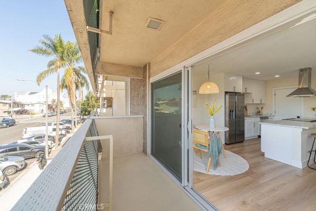 balcony with an outdoor kitchen