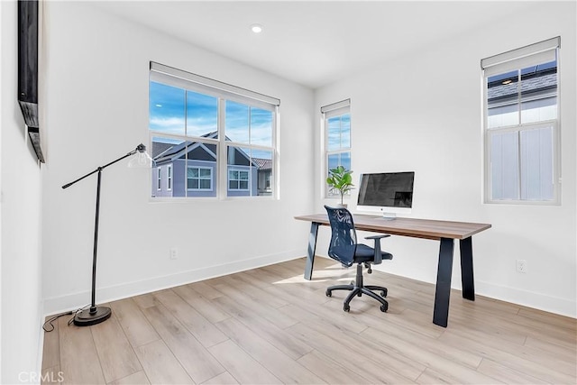 office space featuring light hardwood / wood-style floors