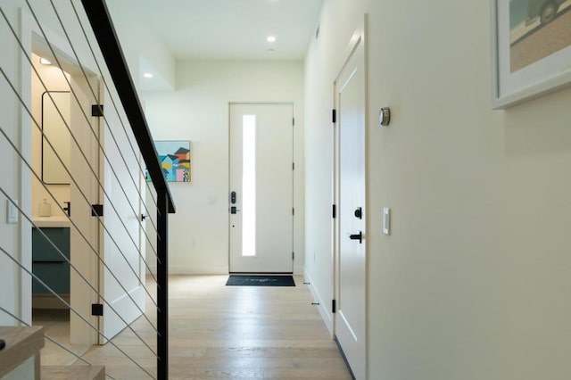 doorway to outside featuring light wood-type flooring