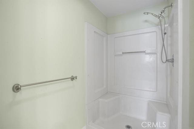 bathroom featuring walk in shower