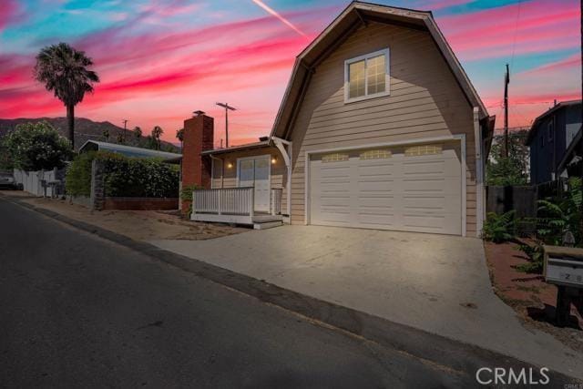 front facade with a garage