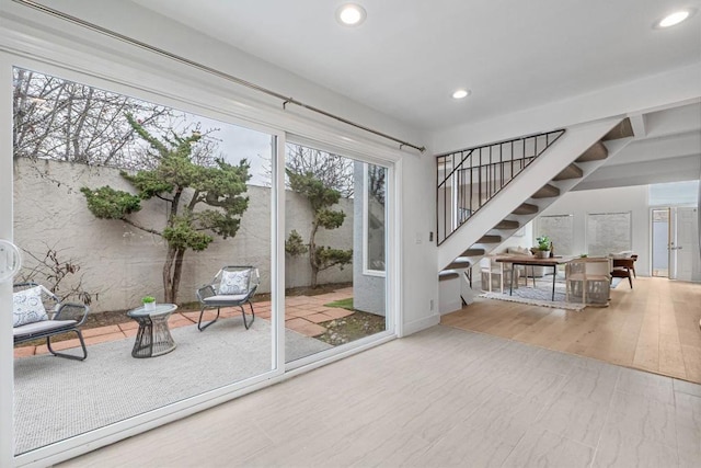 doorway to outside with hardwood / wood-style flooring