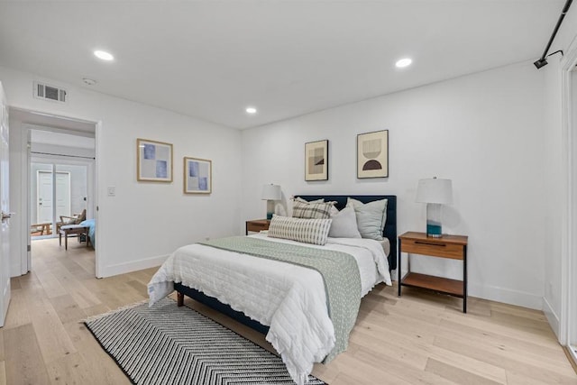 bedroom featuring light wood-type flooring