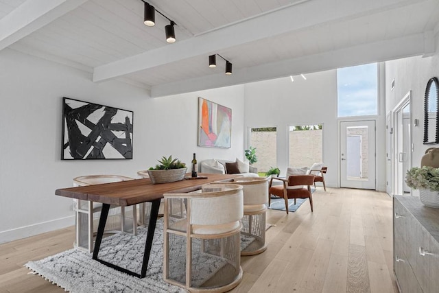 home office with wood ceiling, track lighting, beam ceiling, and light wood-type flooring