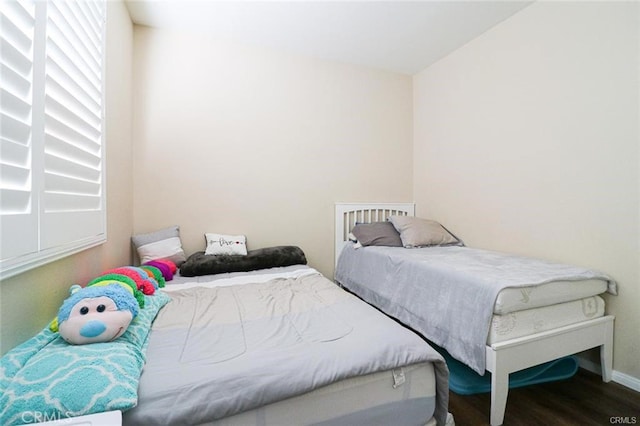 bedroom featuring hardwood / wood-style flooring