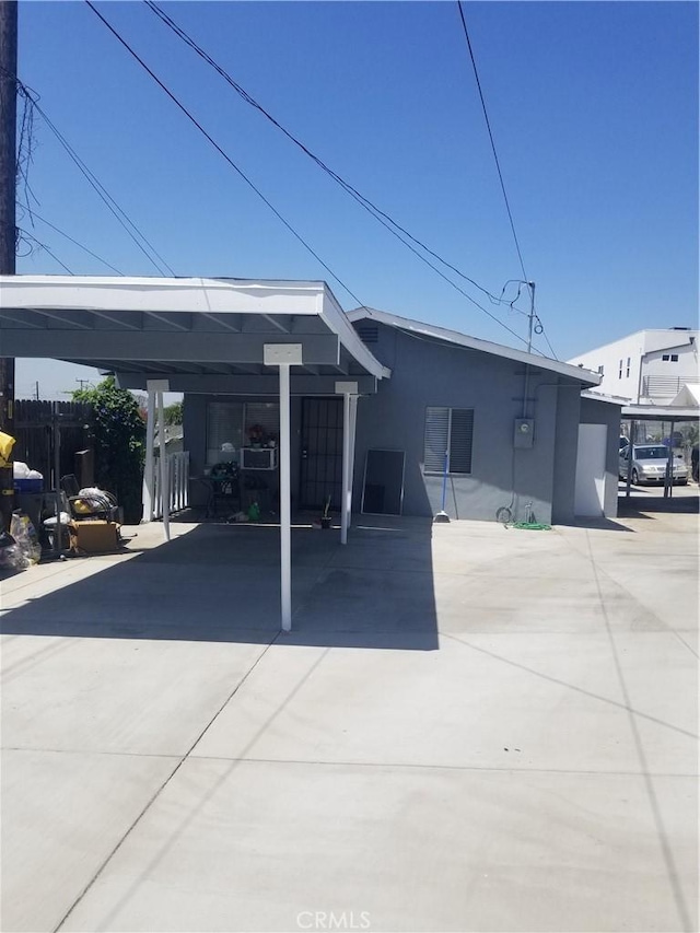 view of car parking with a carport