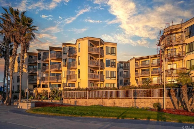 view of outdoor building at dusk